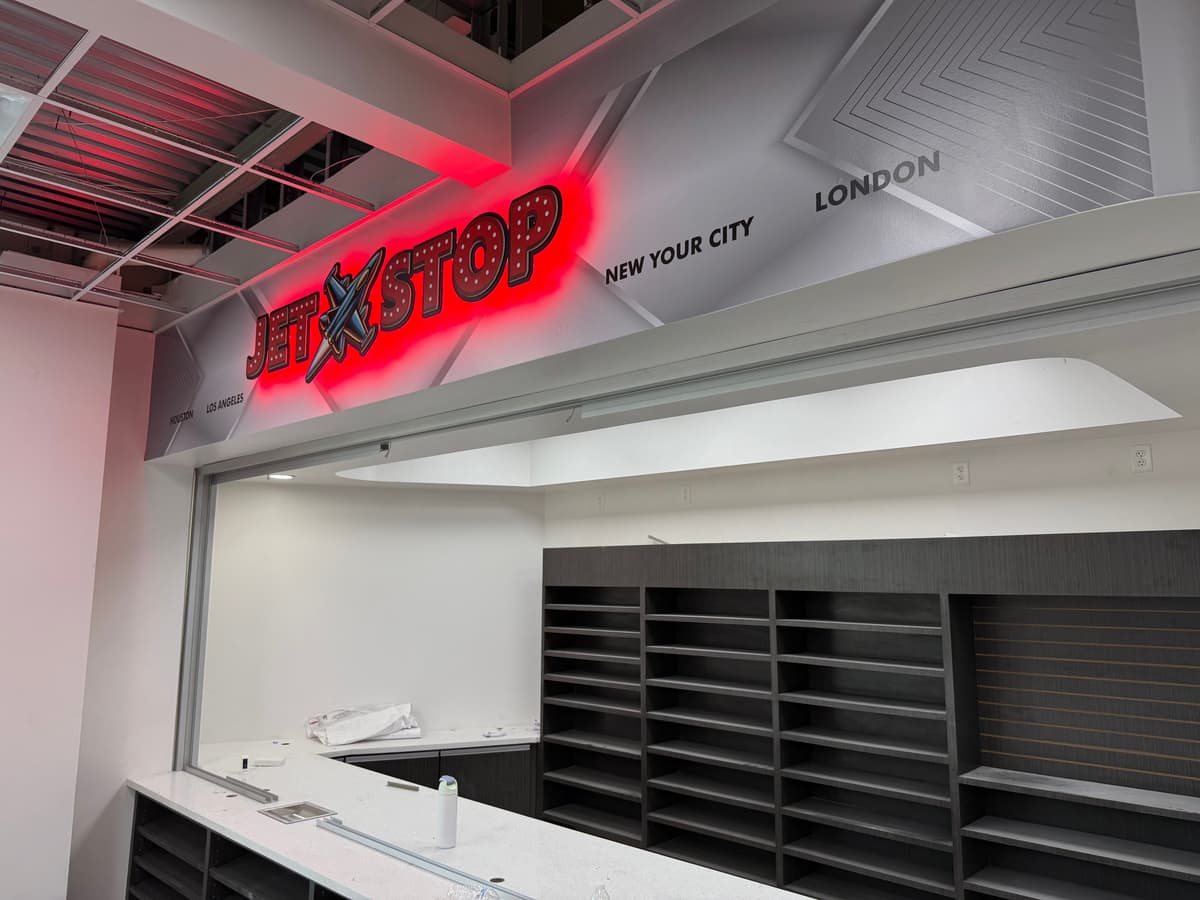 Illuminated red interior channel letter sign