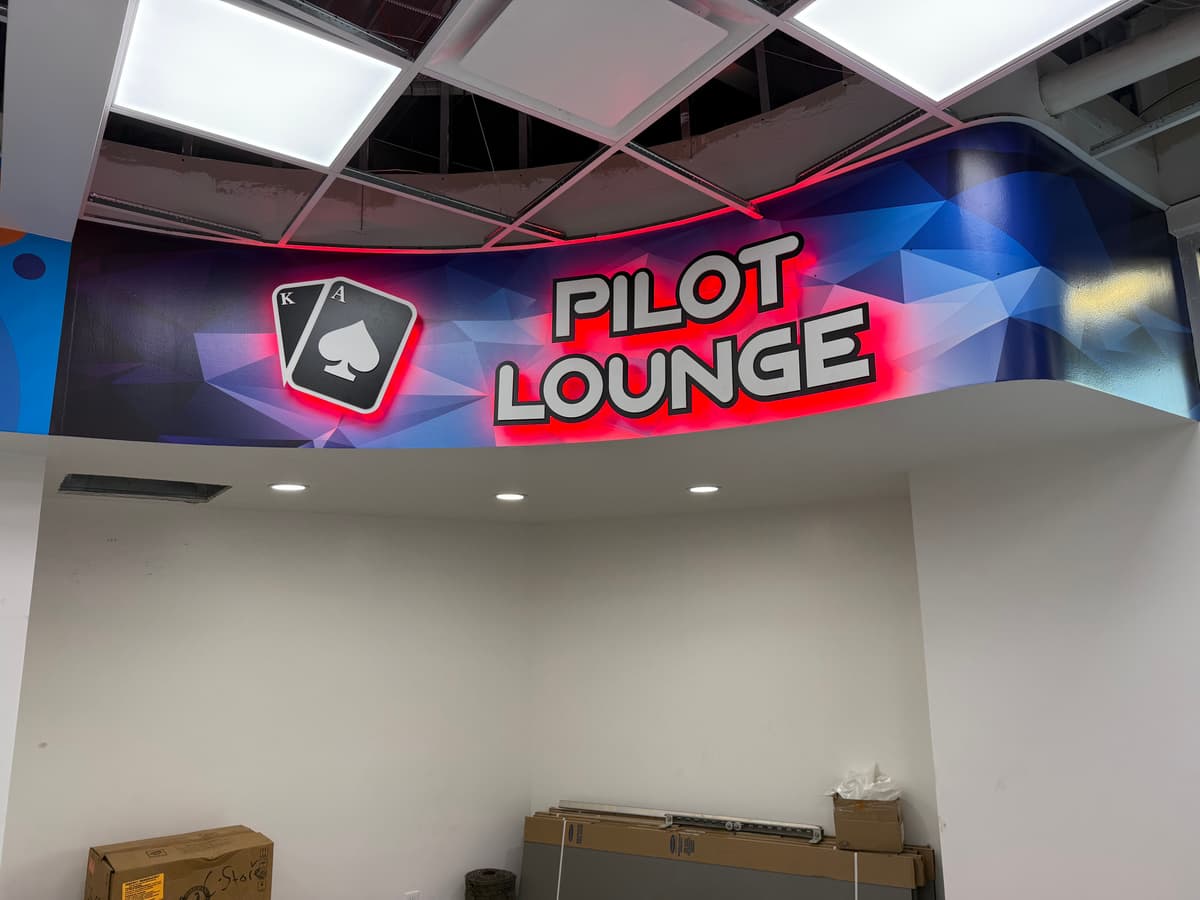Backlit neon-style interior sign