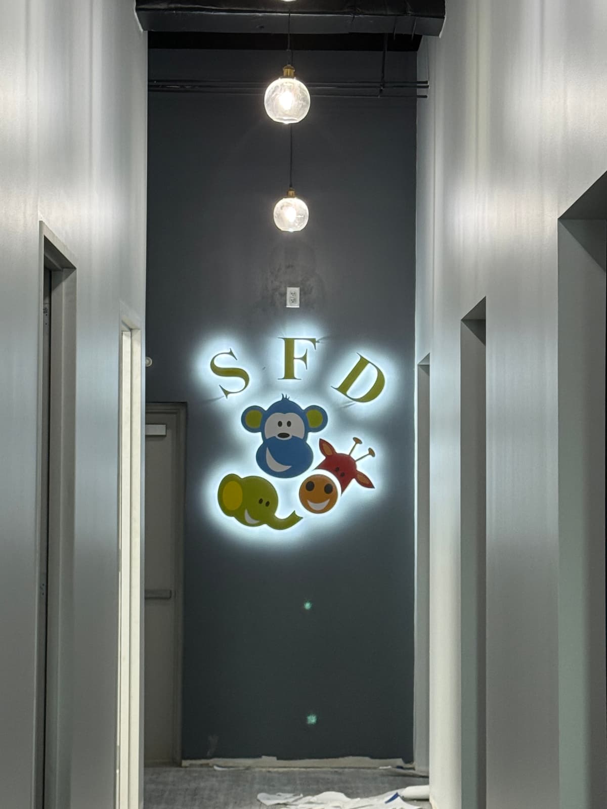 Illuminated dimensional wall letters for interior lobby signage