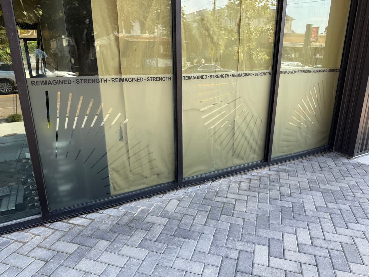Frosted privacy window film with a custom cut pattern